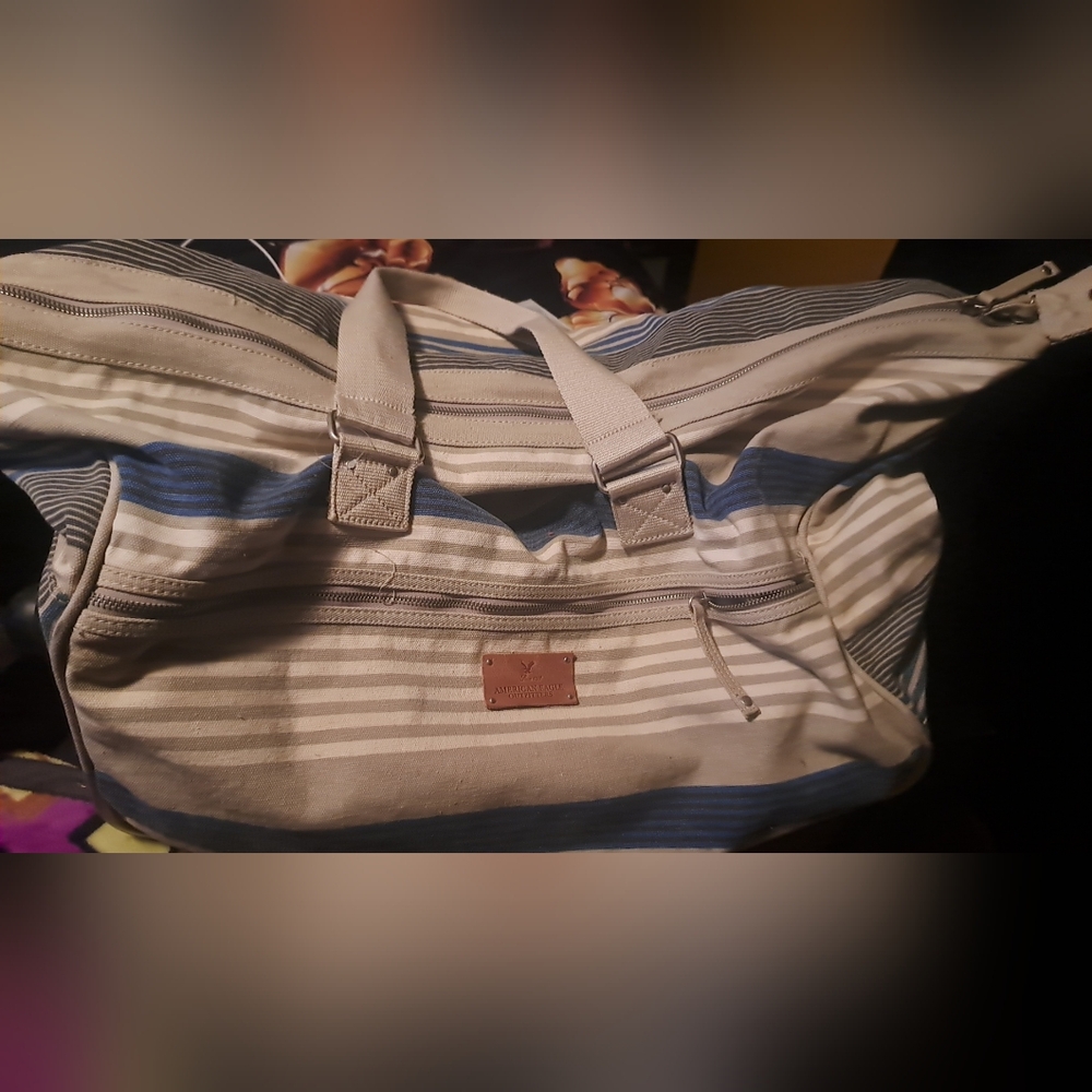 COPY - American eagle outlander rolling duffel travel luggage